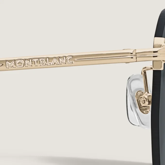 Runde Sonnenbrille mit goldfarbenem Metallrahmen Runde Sonnenbrille mit goldfarbenem Metallrahmen